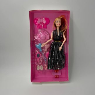 Лялька Барбі в сукні
